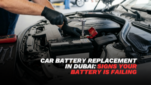 car battery replacement Dubai mechanic checking vehicle battery