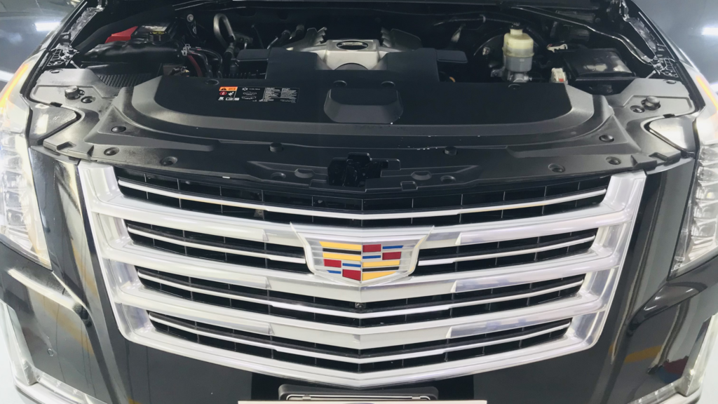 Removal of swirl marks, scratches, and other imperfections from the car’s paintwork with machine polishing and clay bar treatment