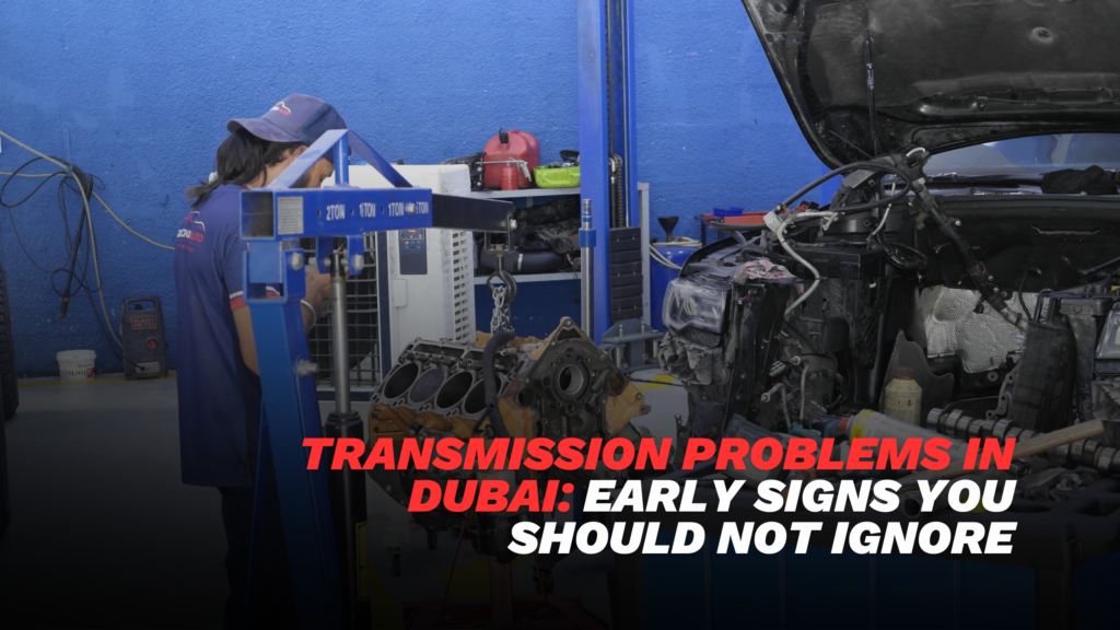 transmission problems Dubai mechanic inspecting gearbox in luxury car