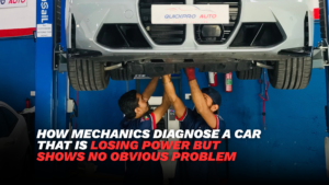 Car losing power being diagnosed by a technician at an auto workshop in Dubai